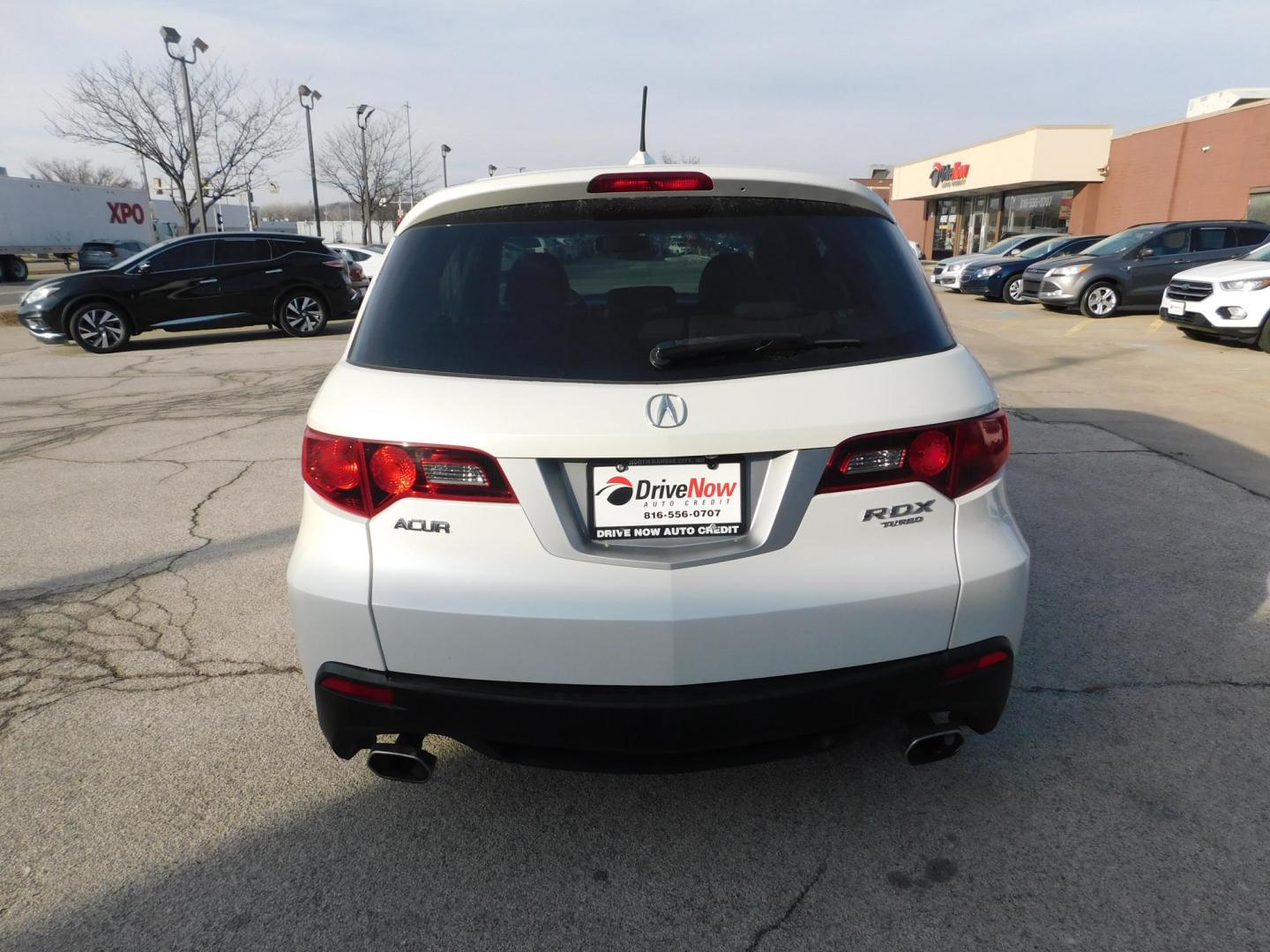 2010 WHITE Acura RDX 5-Spd AT (5J8TB2H2XAA) with an 2.3L L4 DOHC 16V engine, 5-Speed Automatic transmission, located at 2121 Burlington St, North Kansas City, MO, 64116, (816) 556-0707, 39.144707, -94.581978 - Photo#9