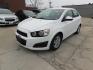 2016 WHITE Chevrolet Sonic LT Auto Sedan (1G1JC5SH1G4) with an 1.8L L4 DOHC 24V engine, 6A transmission, located at 2121 Burlington St, North Kansas City, MO, 64116, (816) 556-0707, 39.144707, -94.581978 - Photo#0