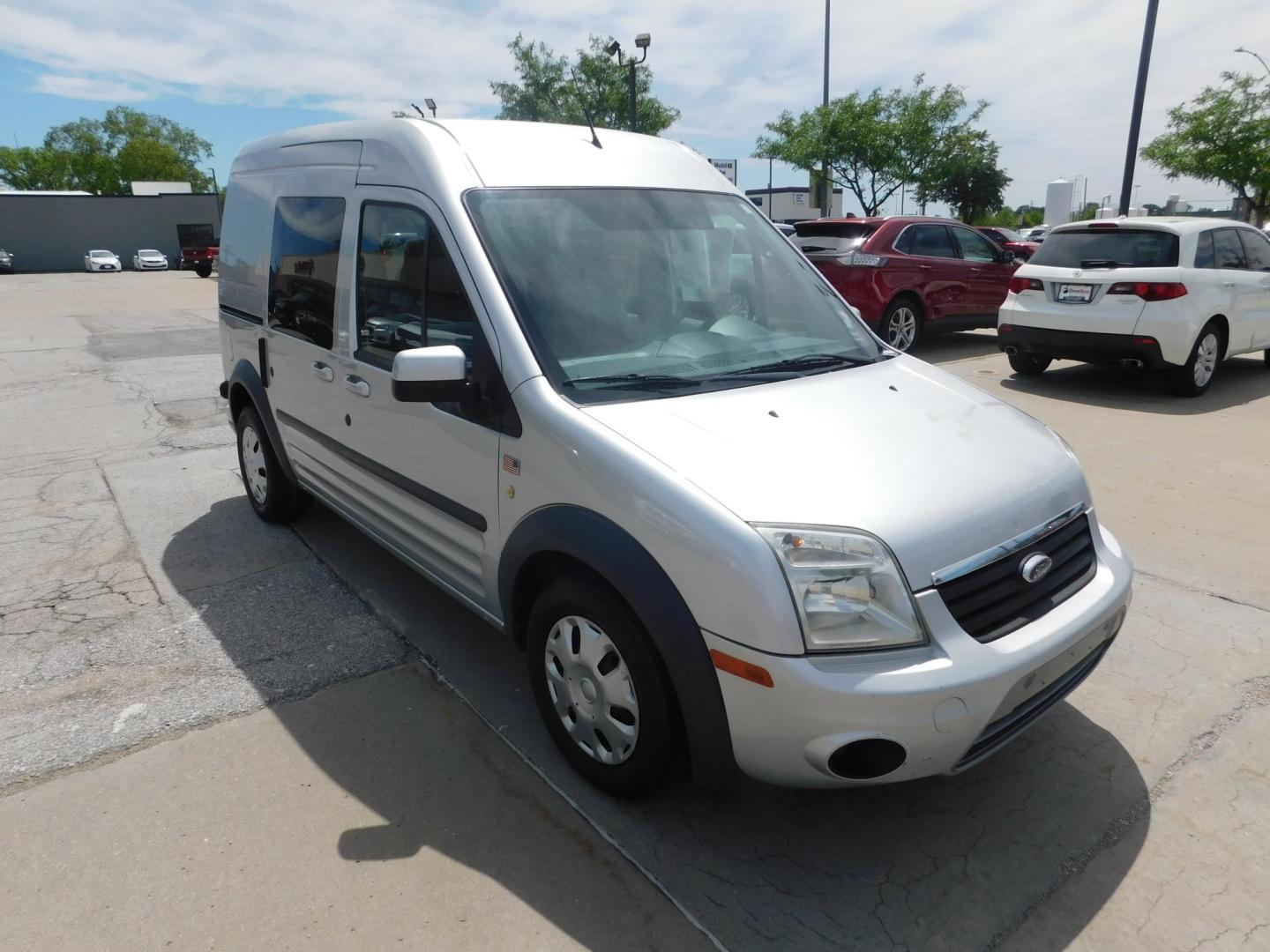 2012 SIVER Ford Transit Connect XLT Wagon (NM0KS9BN1CT) with an 2.0L L4 DOHC 16V engine, 4-Speed Automatic transmission, located at 2121 Burlington St, North Kansas City, MO, 64116, (816) 556-0707, 39.144707, -94.581978 - Photo#8