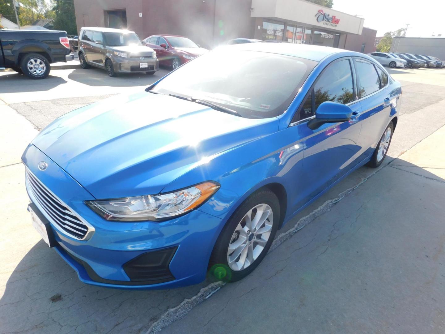 2019 BLUE Ford Fusion SE (3FA6P0HD0KR) with an 1.5L L4 DOHC 16V engine, 6A transmission, located at 2121 Burlington St, North Kansas City, MO, 64116, (816) 556-0707, 39.144707, -94.581978 - Photo#0