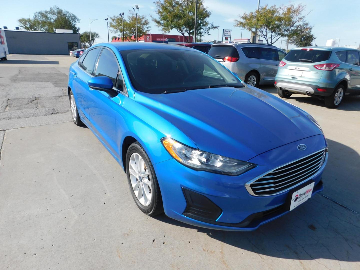 2019 BLUE Ford Fusion SE (3FA6P0HD0KR) with an 1.5L L4 DOHC 16V engine, 6A transmission, located at 2121 Burlington St, North Kansas City, MO, 64116, (816) 556-0707, 39.144707, -94.581978 - Photo#9