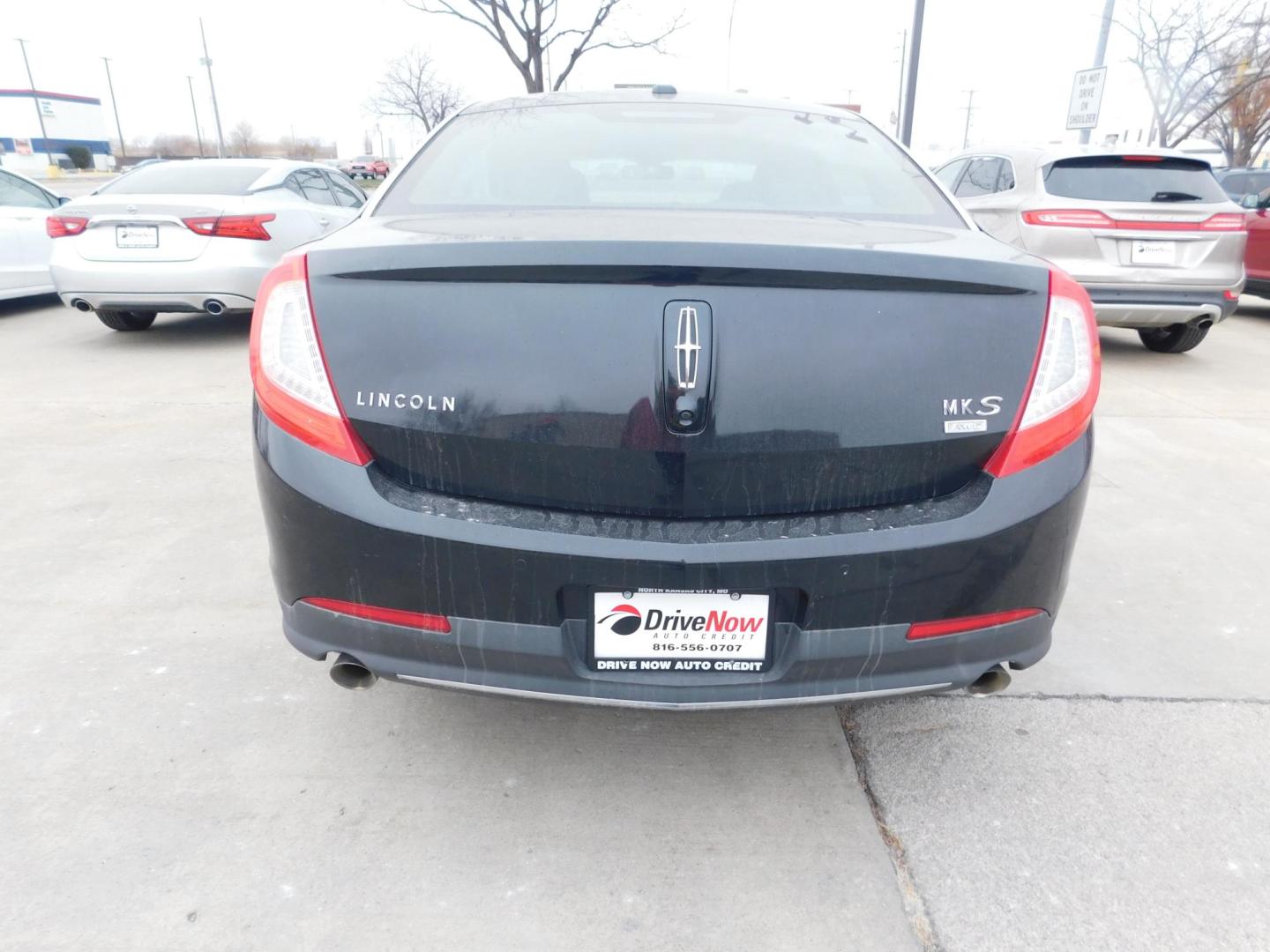 2013 BLACK Lincoln MKS AWD (1LNHL9EK8DG) with an 3.5L V6 DOHC 24V engine, 6-Speed Automatic transmission, located at 2121 Burlington St, North Kansas City, MO, 64116, (816) 556-0707, 39.144707, -94.581978 - Photo#10