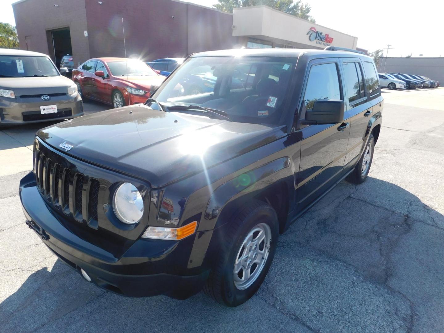 2015 BLACK Jeep Patriot Sport 2WD (1C4NJPBAXFD) with an 2.0L L4 DOHC 16V engine, located at 2121 Burlington St, North Kansas City, MO, 64116, (816) 556-0707, 39.144707, -94.581978 - Photo#0