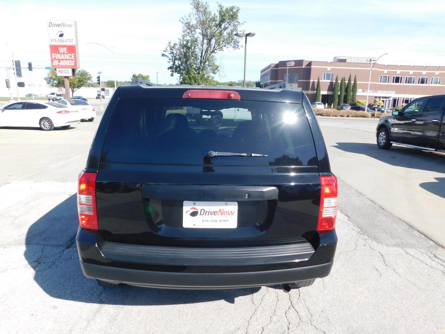 2015 BLACK Jeep Patriot Sport 2WD (1C4NJPBAXFD) with an 2.0L L4 DOHC 16V engine, located at 2121 Burlington St, North Kansas City, MO, 64116, (816) 556-0707, 39.144707, -94.581978 - Photo#7