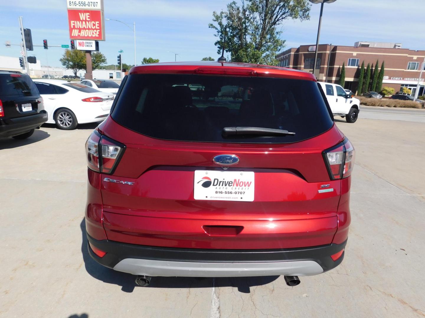 2017 RED Ford Escape SE FWD (1FMCU0GD4HU) with an 1.5L L4 DOHC 16V engine, 6A transmission, located at 2121 Burlington St, North Kansas City, MO, 64116, (816) 556-0707, 39.144707, -94.581978 - Photo#8