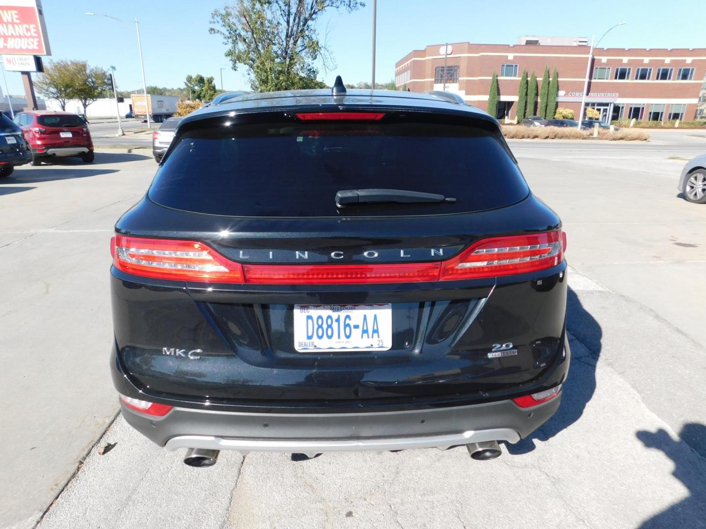 2015 BLACK Lincoln MKC FWD (5LMCJ1A9XFU) with an 2.0L L4 DOHC 16V engine, 6-Speed Automatic transmission, located at 2121 Burlington St, North Kansas City, MO, 64116, (816) 556-0707, 39.144707, -94.581978 - Photo#10