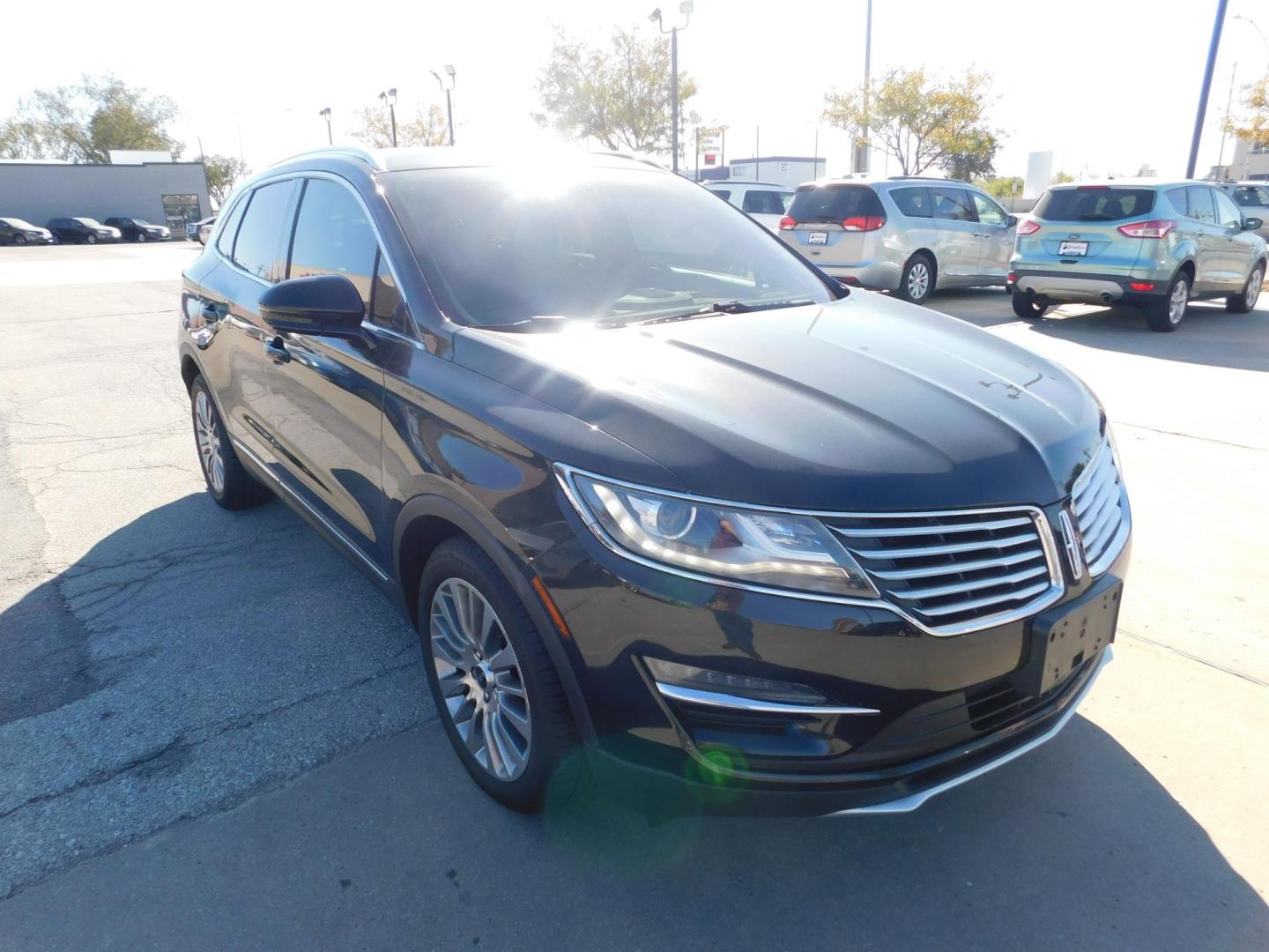 2015 BLACK Lincoln MKC FWD (5LMCJ1A9XFU) with an 2.0L L4 DOHC 16V engine, 6-Speed Automatic transmission, located at 2121 Burlington St, North Kansas City, MO, 64116, (816) 556-0707, 39.144707, -94.581978 - Photo#11