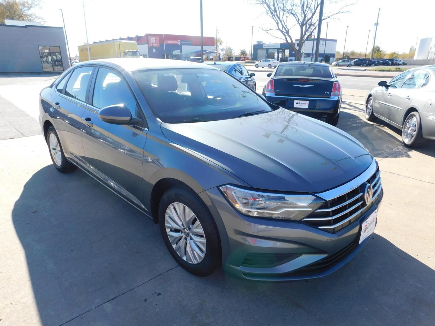 2019 GRAY Volkswagen Jetta 1.4T SE 8A (3VWC57BU0KM) with an 1.4L L4 DOHC 20V engine, 8A transmission, located at 2121 Burlington St, North Kansas City, MO, 64116, (816) 556-0707, 39.144707, -94.581978 - Photo#9