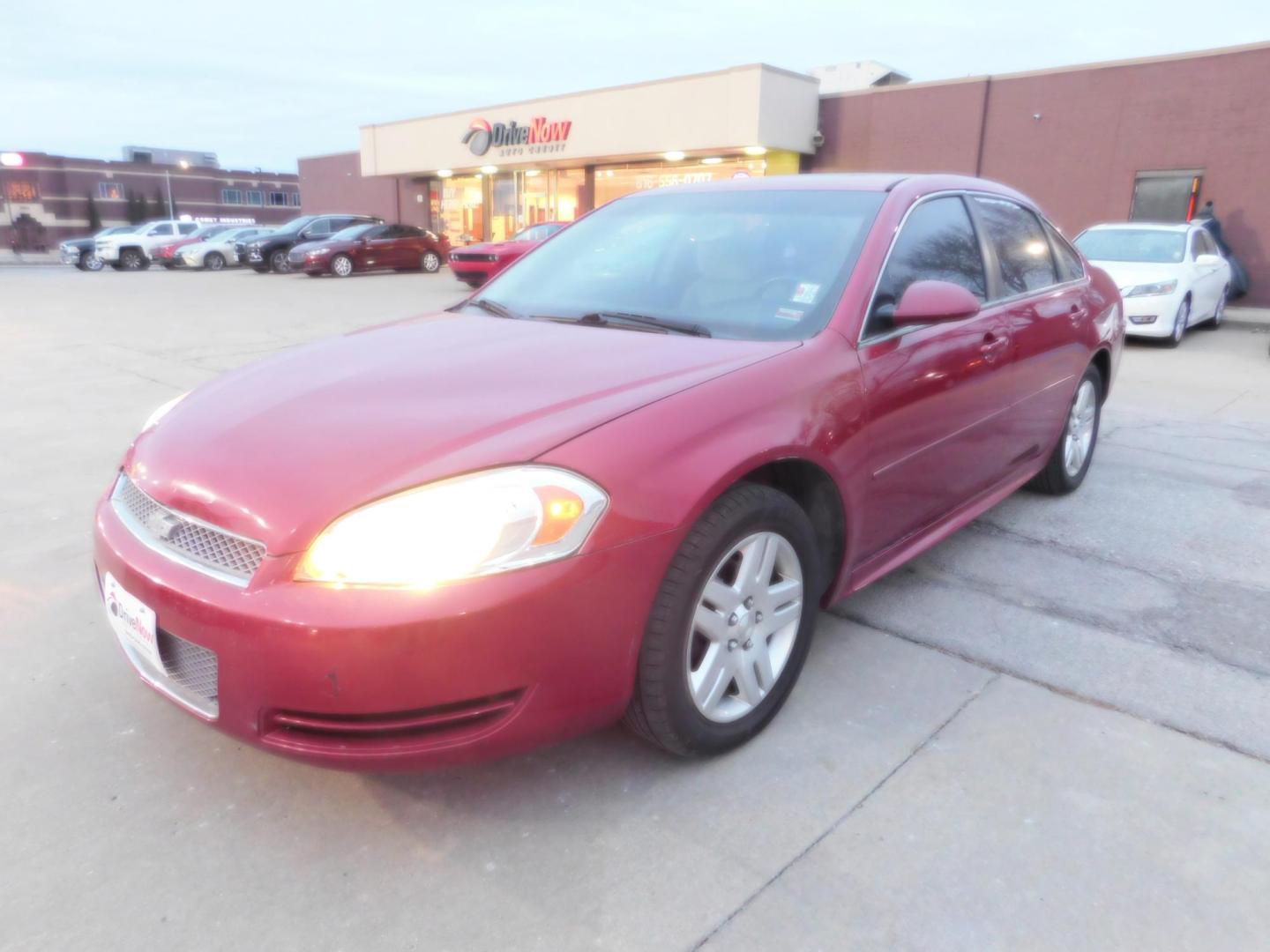 2014 RED Chevrolet Impala LT (2G1WB5E39E1) with an 3.6L V6 DOHC 16V FFV engine, 6-Speed Automatic transmission, located at 2121 Burlington St, North Kansas City, MO, 64116, (816) 556-0707, 39.144707, -94.581978 - Photo#0