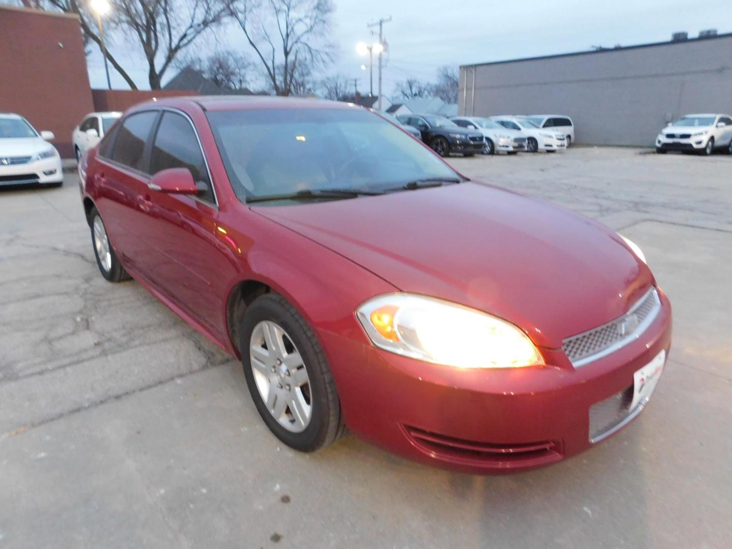 2014 RED Chevrolet Impala LT (2G1WB5E39E1) with an 3.6L V6 DOHC 16V FFV engine, 6-Speed Automatic transmission, located at 2121 Burlington St, North Kansas City, MO, 64116, (816) 556-0707, 39.144707, -94.581978 - Photo#9