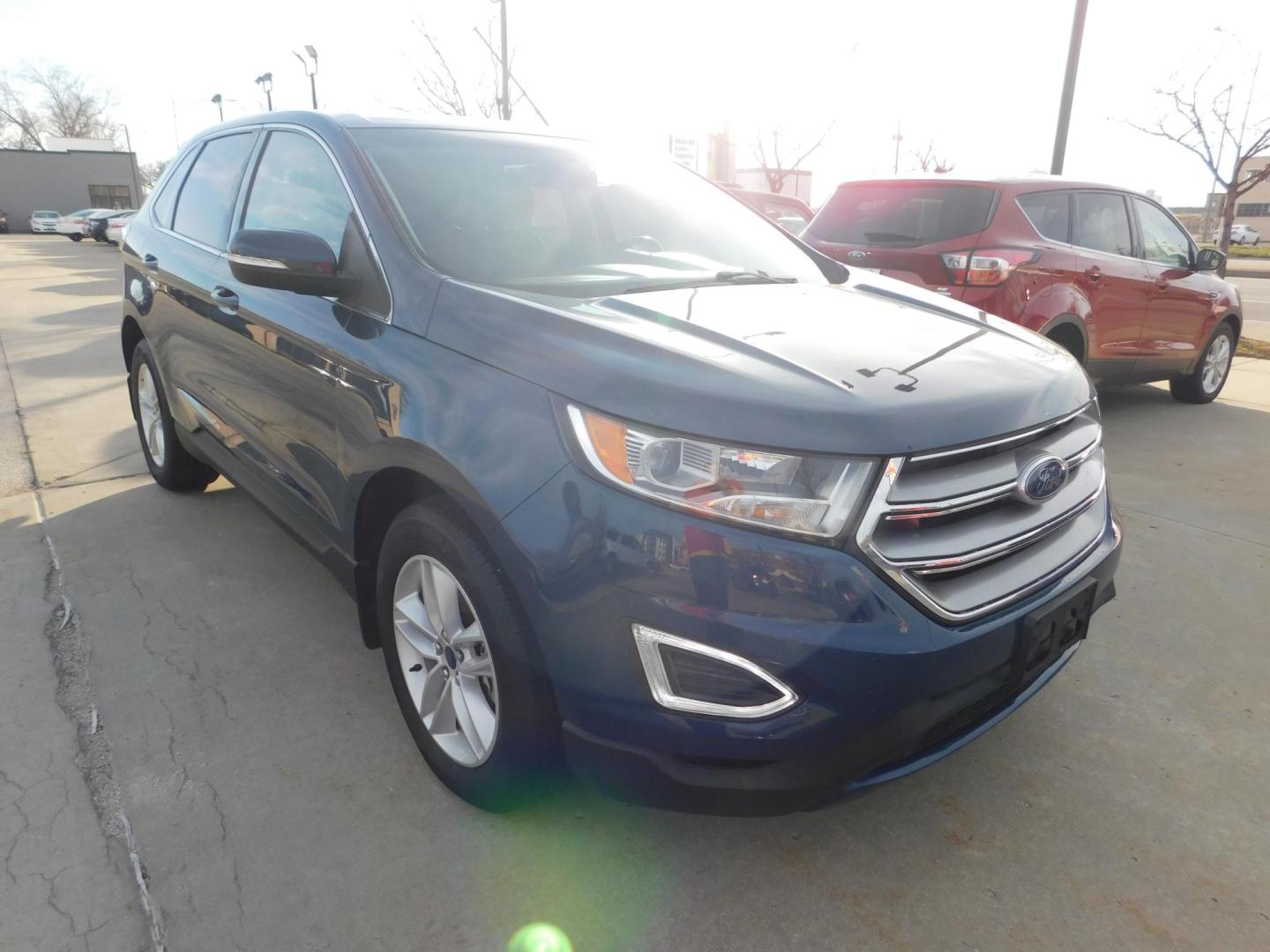 2017 BLUE Ford Edge SEL FWD (2FMPK3J90HB) with an 2.0L L4 DOHC 16V engine, 6A transmission, located at 2121 Burlington St, North Kansas City, MO, 64116, (816) 556-0707, 39.144707, -94.581978 - Photo#9