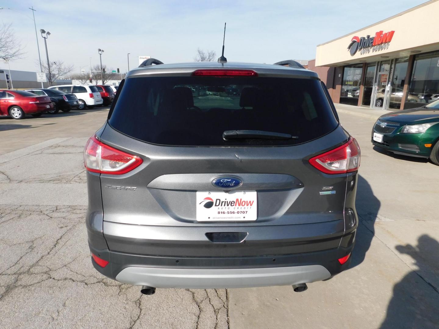 2014 GRAY Ford Escape SE 4WD (1FMCU9GXXEU) with an 1.6L L4 DOHC 16V engine, 6-Speed Automatic transmission, located at 2121 Burlington St, North Kansas City, MO, 64116, (816) 556-0707, 39.144707, -94.581978 - Photo#10