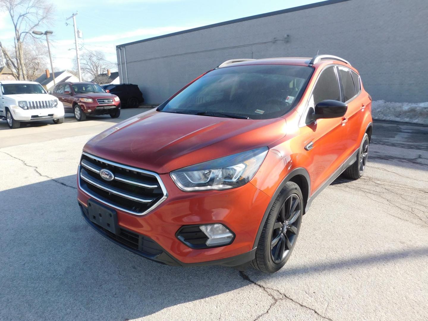 2019 COPPER Ford Escape SE FWD (1FMCU0GD2KU) with an 1.5L L4 DOHC 16V engine, 6A transmission, located at 2121 Burlington St, North Kansas City, MO, 64116, (816) 556-0707, 39.144707, -94.581978 - Photo#0