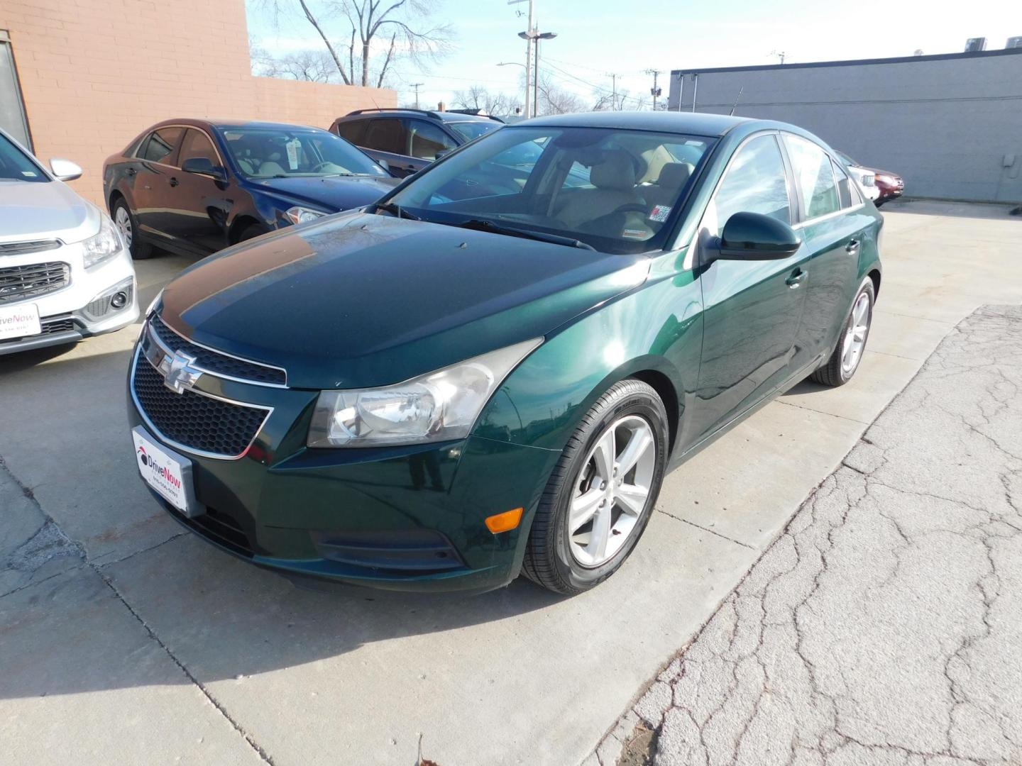 2014 GREEN Chevrolet Cruze 2LT Auto (1G1PE5SB2E7) with an 1.4L L4 DOHC 16V TURBO engine, 6-Speed Automatic transmission, located at 2121 Burlington St, North Kansas City, MO, 64116, (816) 556-0707, 39.144707, -94.581978 - Photo#0