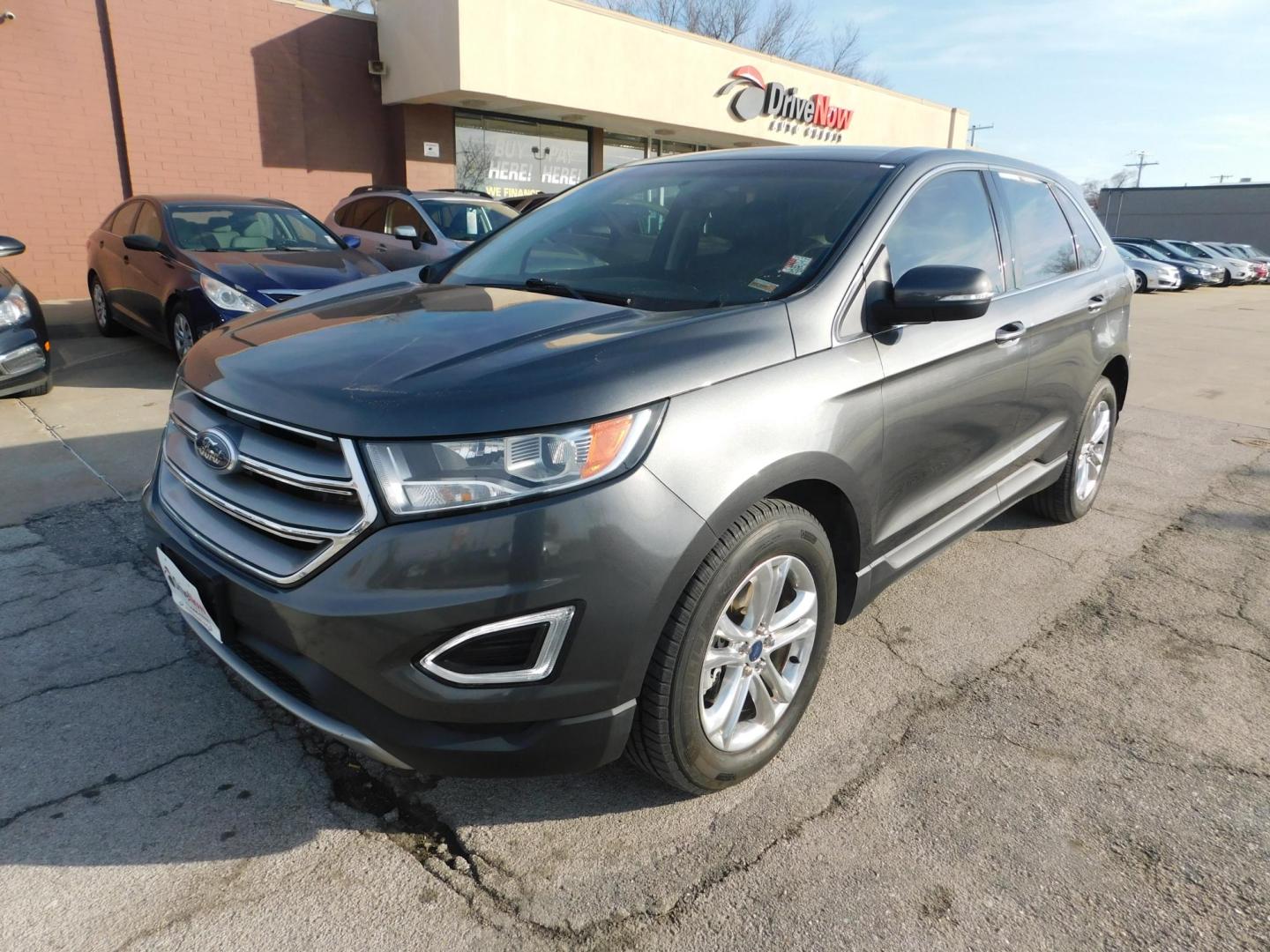 2016 GRAY Ford Edge SEL FWD (2FMPK3J84GB) with an 3.5L V6 DOHC 24V engine, 6A transmission, located at 2121 Burlington St, North Kansas City, MO, 64116, (816) 556-0707, 39.144707, -94.581978 - Photo#0